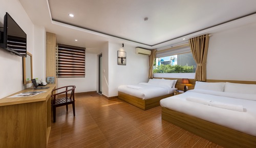 Habitación cuádruple Deluxe, 2 camas de matrimonio, vistas a la ciudad