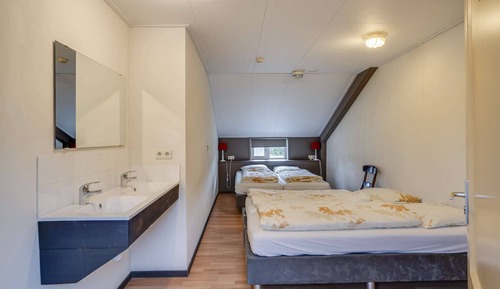 Habitación cuádruple, varias camas
