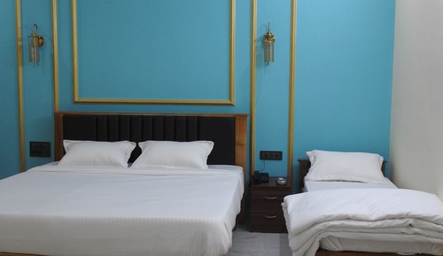 Habitación triple ejecutiva