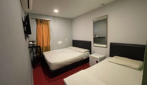 Suite superior, varias camas