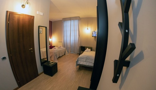 Habitación triple, vistas a la ciudad