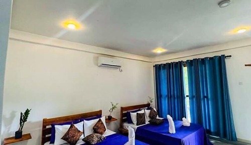 Habitación cuádruple Deluxe