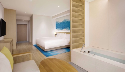 Habitación Deluxe, 1 cama de matrimonio grande, vistas parciales al mar
