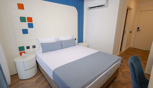 Habitación estándar con 1 cama doble o 2 individuales