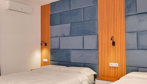 Habitación triple, vistas al jardín