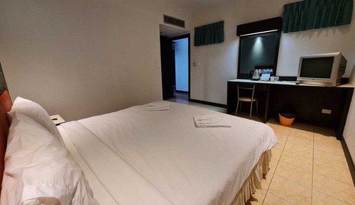 Habitación estándar con 1 cama doble o 2 individuales