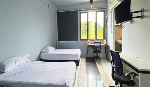 Suite estudio familiar, baño compartido