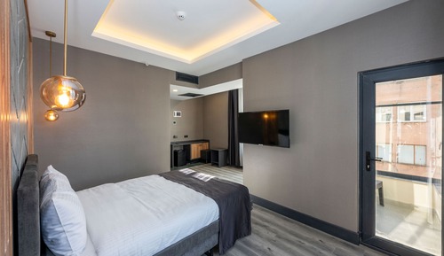 Habitación Deluxe, 1 cama doble, balcón, vistas a la ciudad