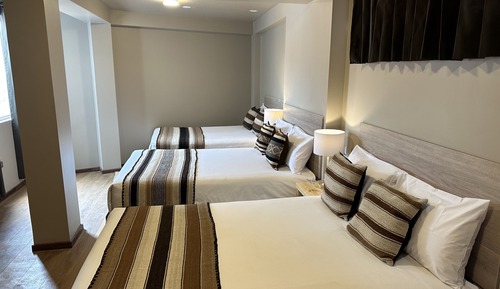 Habitación triple Deluxe