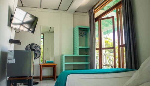 Habitación individual Confort, 1 cama individual grande, fumadores, vistas parciales al mar