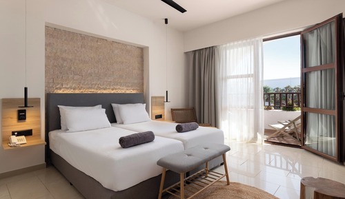 Suite familiar, vistas parciales al mar
