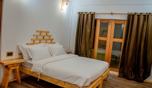 Habitación Deluxe con 1 cama doble o 2 individuales