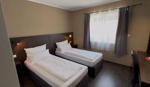 Habitación con 2 camas individuales