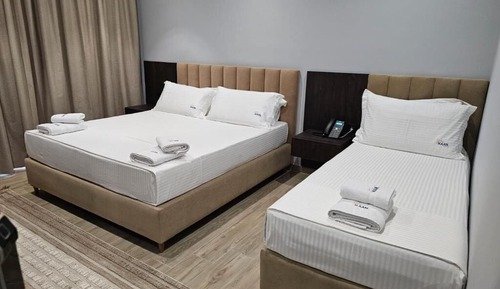 Habitación triple, balcón