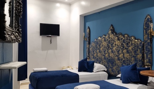 Habitación cuádruple familiar, varias camas