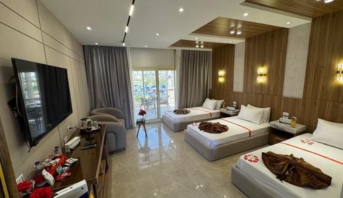 Habitación triple de lujo