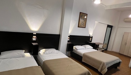 Habitación triple familiar, varias camas