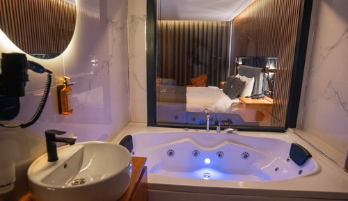 Habitación Deluxe, bañera de hidromasaje, vistas al mar