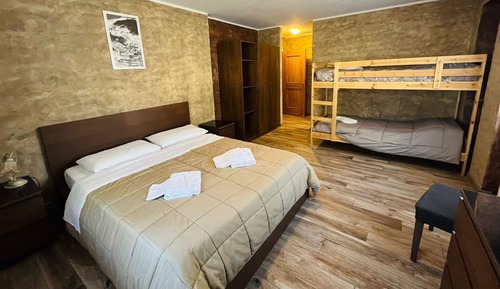 Habitación cuádruple estándar, varias camas