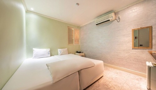 Habitación con 2 camas individuales