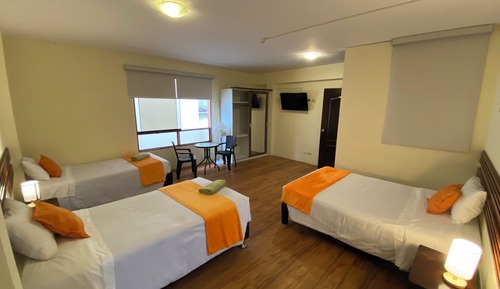 Habitación cuádruple clásica, dormitorio mixto, no fumadores, baño privado