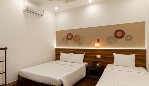 Habitación triple ejecutiva