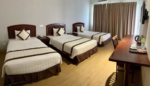 Habitación triple Deluxe, vistas al jardín