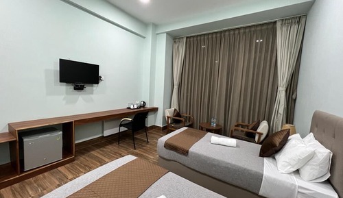 Habitación Deluxe con 1 cama doble o 2 individuales