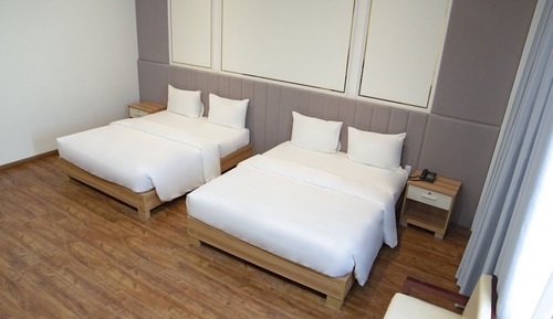 Habitación cuádruple Deluxe, 2 camas de matrimonio