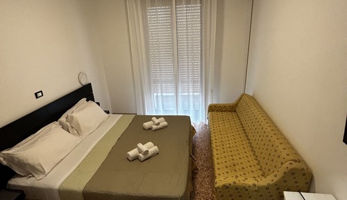 Habitación triple, 1 cama doble con sofá cama