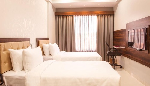 Habitación Deluxe con 1 cama doble o 2 individuales