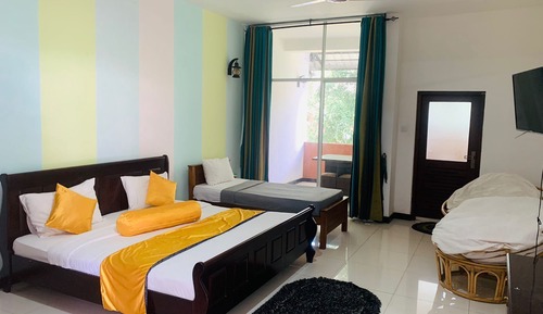 Habitación triple Deluxe