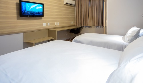 Quarto Triplo Superior uma cama queen size e uma cama de solteiro