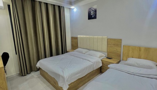 Habitación superior, varias camas