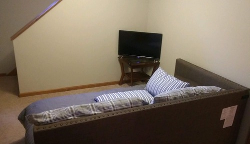 Habitación cuádruple básica, varias camas, baño privado, en la zona del jardín