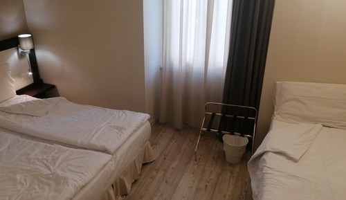 Habitación triple superior, varias camas