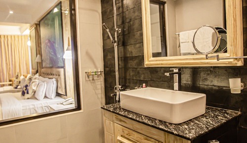 Habitación triple Deluxe, varias camas, vistas al mar