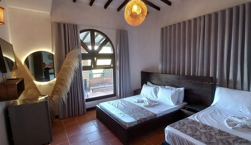 Habitación triple superior, varias camas