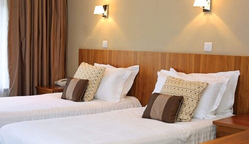 Habitación Club con 1 cama doble o 2 individuales