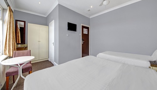 Habitación triple estándar, varias camas