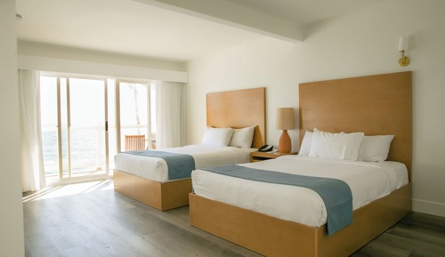 Habitación, 2 camas de matrimonio, frente a la playa