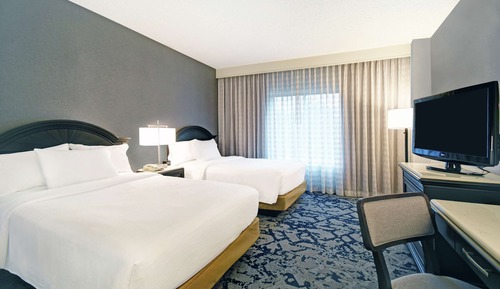 Suite estándar, no fumadores (2 Double Beds with Sofa Bed)