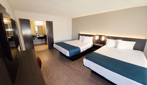 Habitación cuádruple estándar, 2 camas de matrimonio, no fumadores, frigorífico