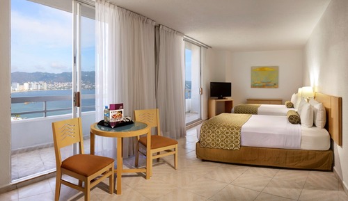 Suite junior, 2 camas dobles, balcón, vistas parciales al mar