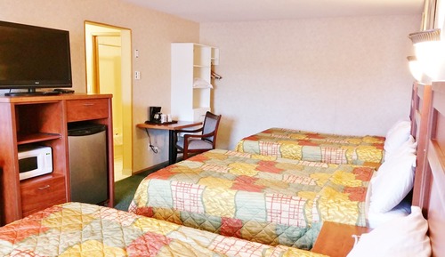 Habitación, varias camas
