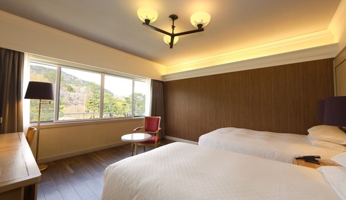 Habitación superior con 2 camas individuales, fumadores, vistas al jardín