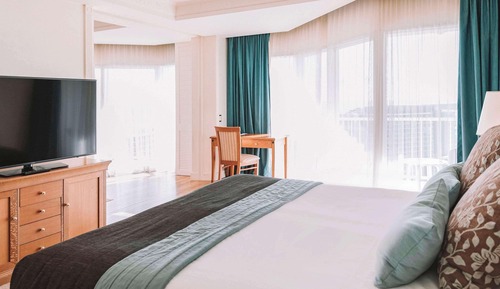 Suite ejecutiva, 1 cama de matrimonio grande, vistas al puerto