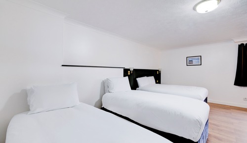 Habitación familiar, varias camas