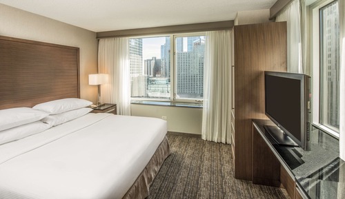Suite, 1 cama de matrimonio grande con sofá cama, vistas a la ciudad, en esquina