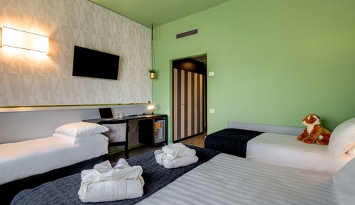 Habitación familiar, varias camas